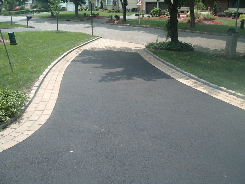 Asphalt driveway with paver detailing